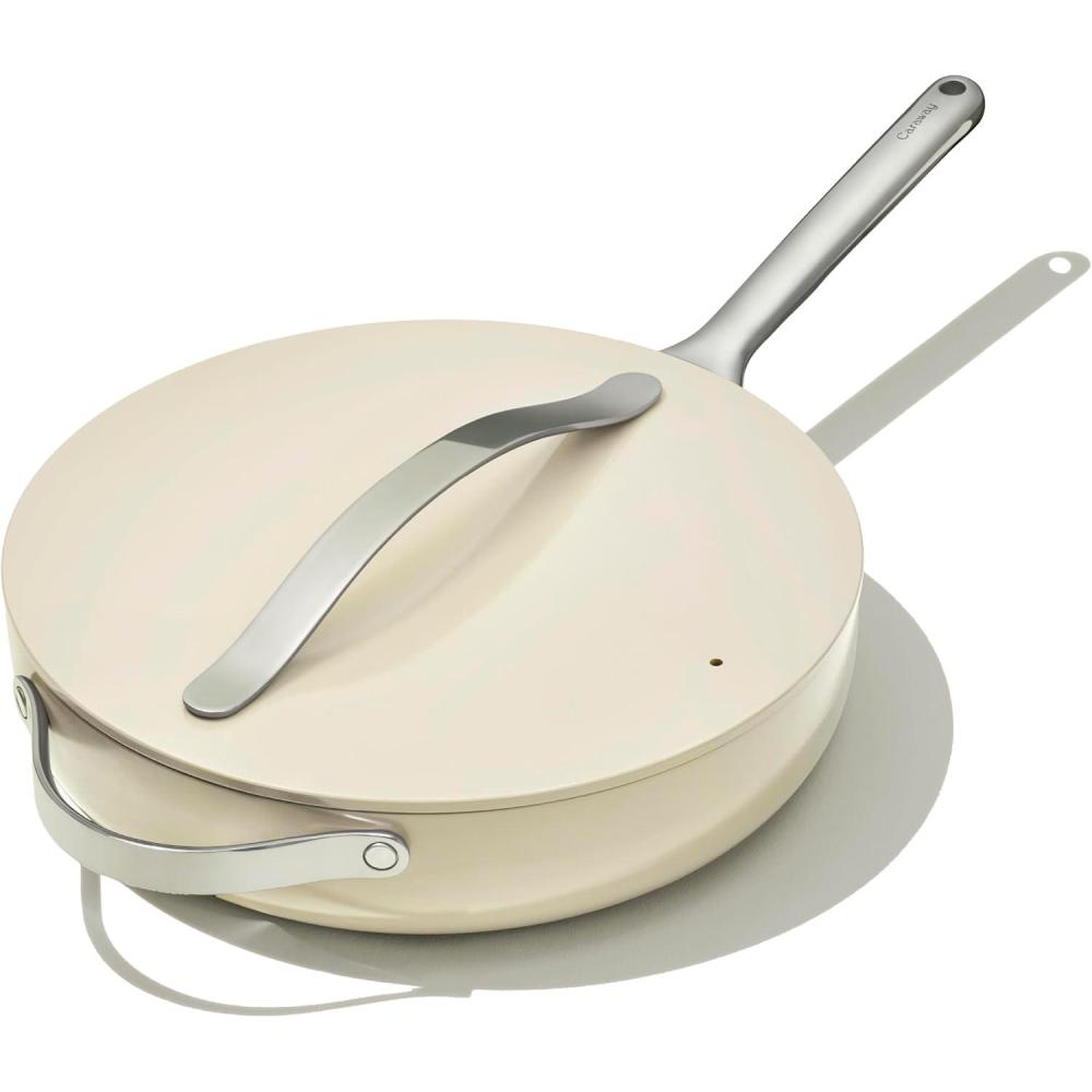 imageCaraway Nonstick Ceramic Saut Pan with Lid 45 qt 118 Non Toxic PTFE amp PFOA Free Oven Safe amp Compatible with All Stovetops Gas Electric amp Induction CreamCream